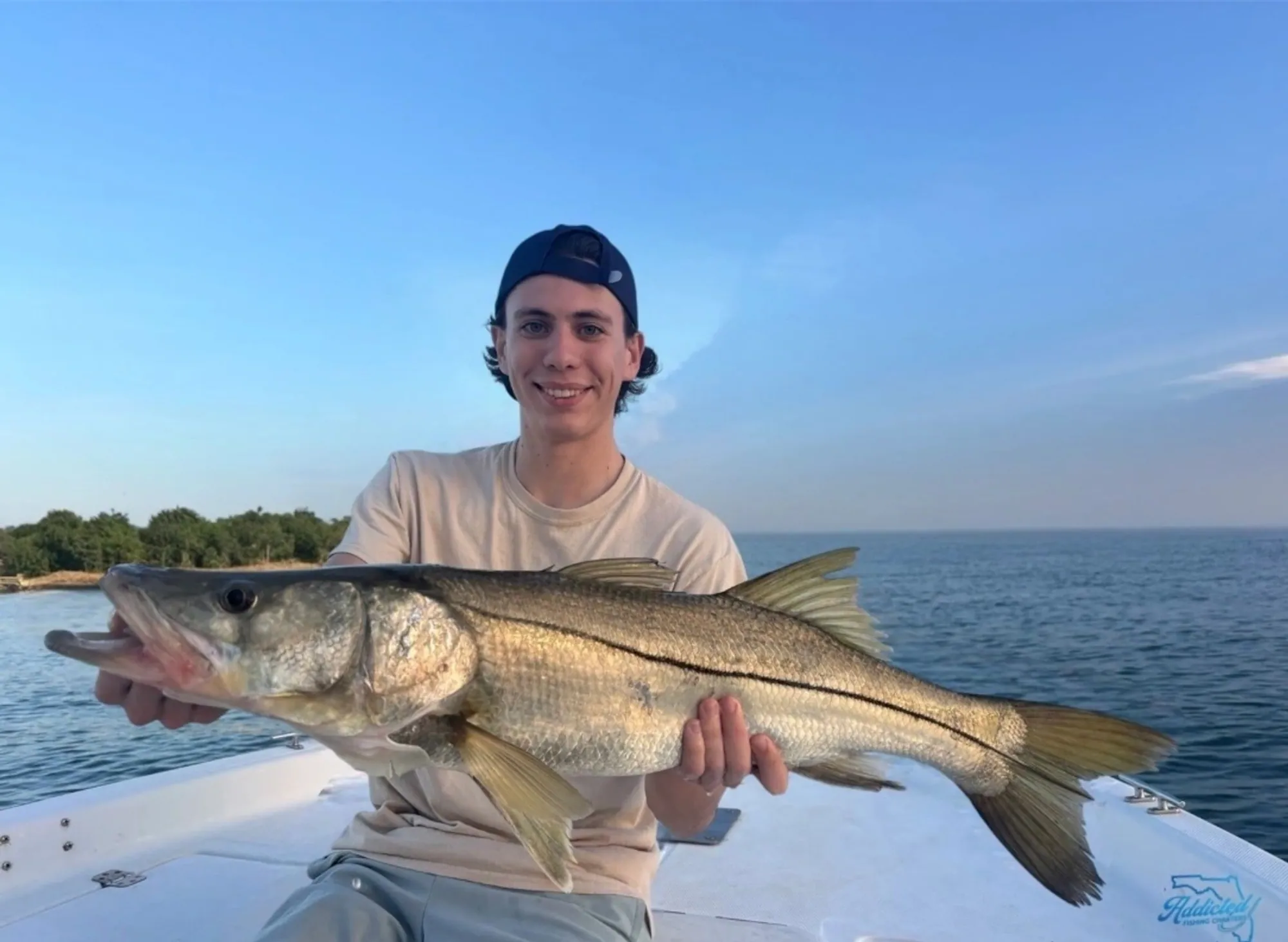 Angler with a bonita/tuna caught nearshore off New Smyrna Beach