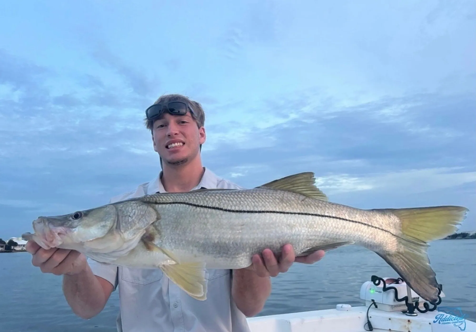 Angler releasing a redfish back into Mosquito Lagoon