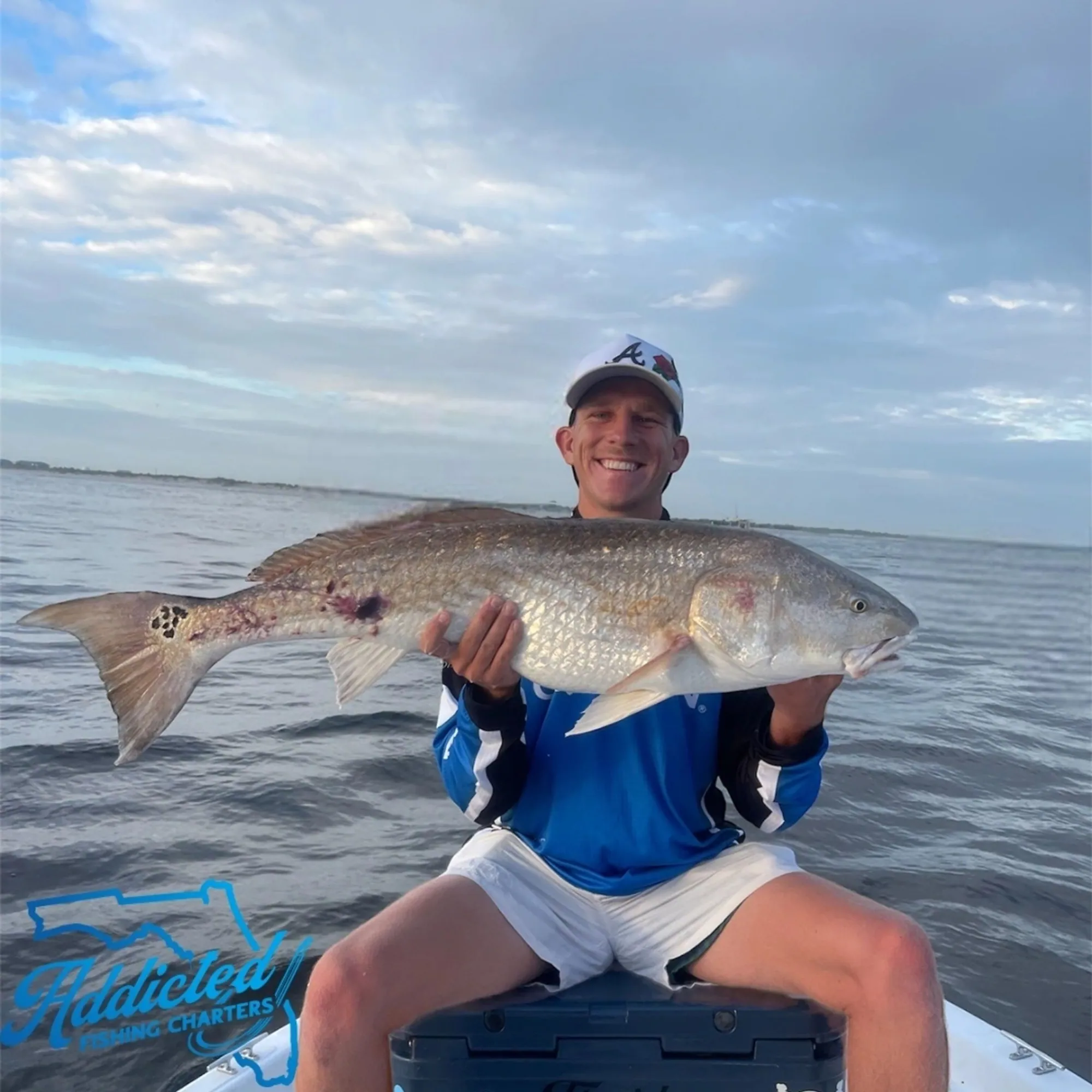 Captain Brenden at the helm of the 25' Contender