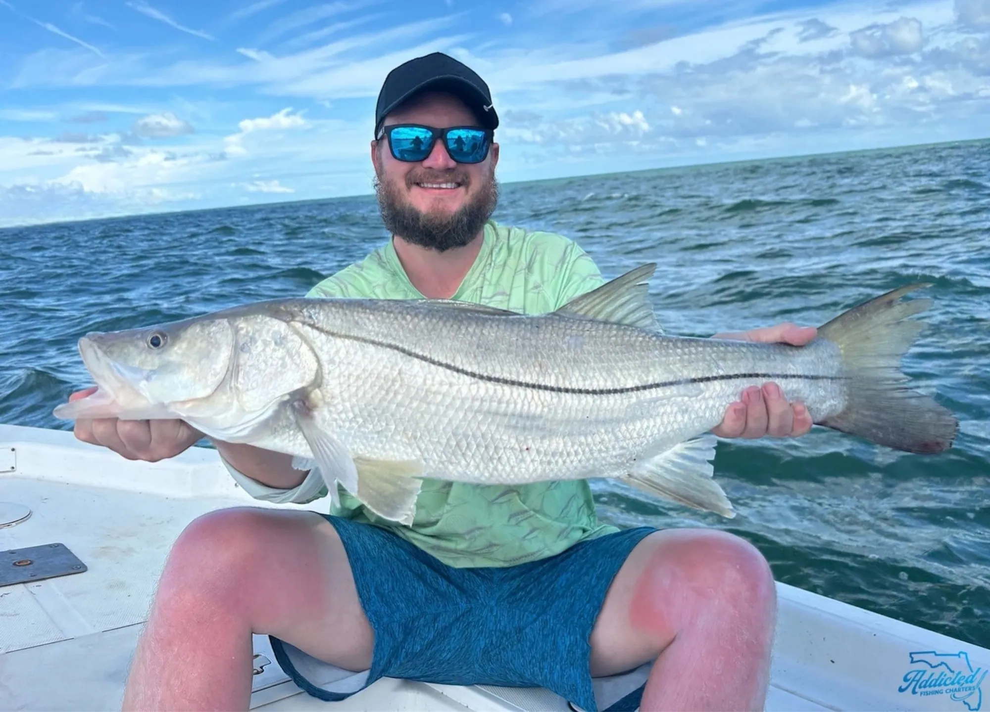 Captain and client double-catch photo